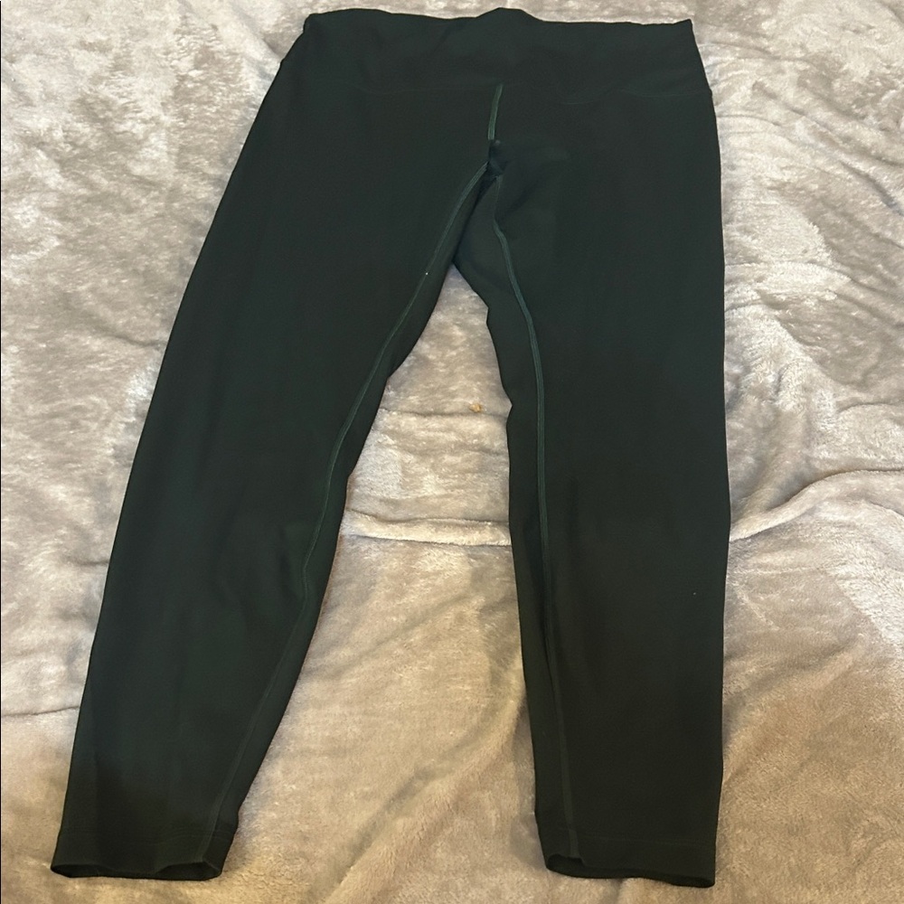 Lululemon wunder train high rise tight in dark green